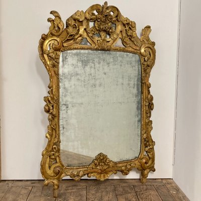Large Provençal mirror in gilded wood 18th century