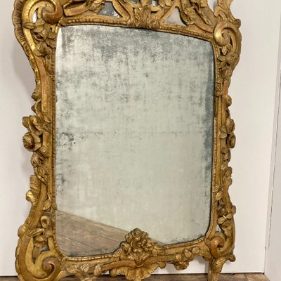 Large Provençal mirror in gilded wood 18th century
