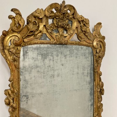 Large Provençal mirror in gilded wood 18th century