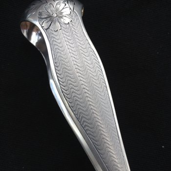 Ice cube/sugar tongs in solid silver, guilloche pattern, silversmith Alphonse DEBAIN 19th century