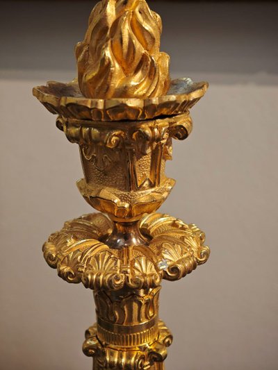 Pair of Restauration-period ormolu torches, circa 1830.
