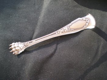 Sugar tongs in solid silver minerva mark louis XV model