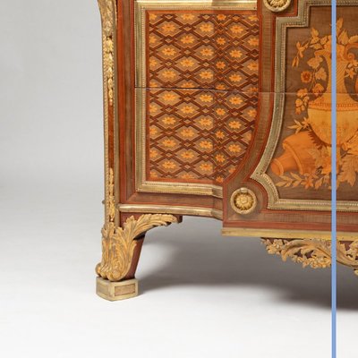 Commode in marquetry of precious woods, gilt bronze and Campan marble, 19th century