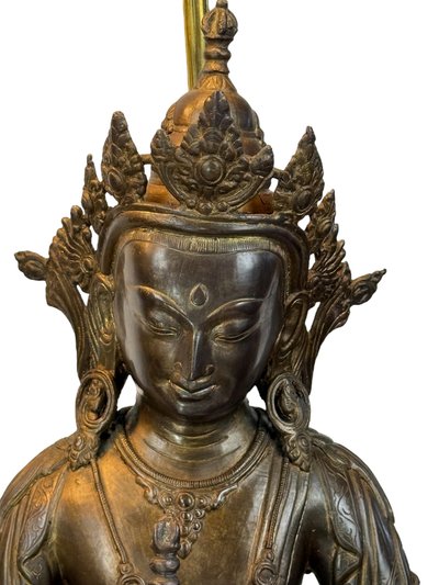 GRANDE PAIRE DE LAMPES EN BRONZE REPRÉSENTANT DES STATUES TIBÉTAINE FIN XIXe