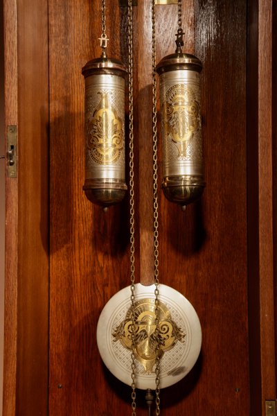 Impressive, magnificent Art Deco Dutch parquet clock in gilded oak.