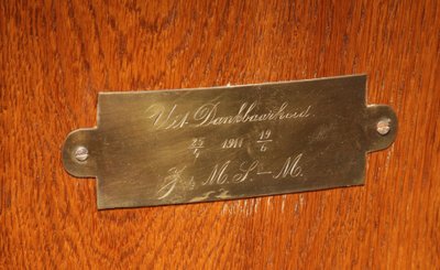 Impressive, magnificent Art Deco Dutch parquet clock in gilded oak.