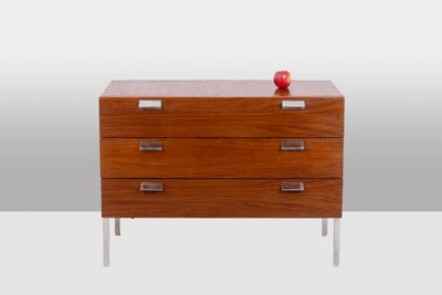 André Monpoix. Cassettone in teak con 3 cassetti. Circa 1960. LS6357708M