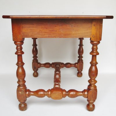 Louis XIV fruitwood table.    