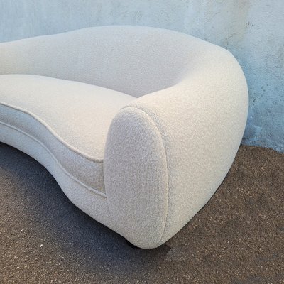 In the style of J Royère, polar bear sofa