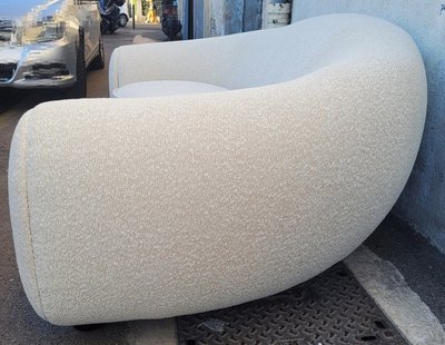In the style of J Royère, polar bear sofa