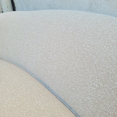 In the style of J Royère, polar bear sofa
