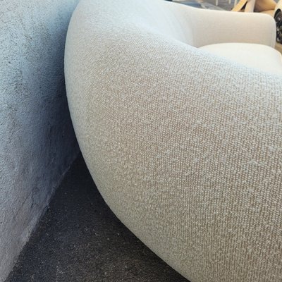 In the style of J Royère, polar bear sofa