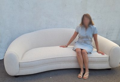 In the style of J Royère, polar bear sofa