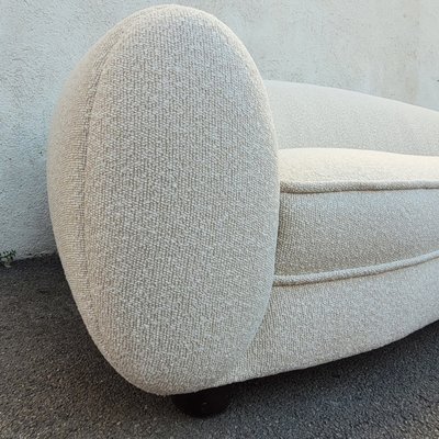 In the style of J Royère, polar bear sofa