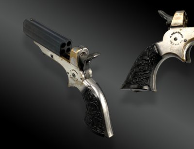 SCATOLA DEL GIOCATORE CON PISTOLA SHARPS & HANKINS, QUATTRO CANNE CAL. 22