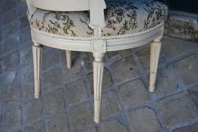 Poltrona bassa in stile Luigi XVI con timbro di Georges Jacob
