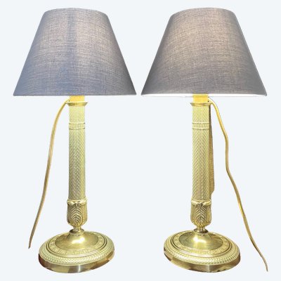 Deliziosa coppia di lampade antiche in bronzo dorato, modello "Cannon Barrel" del periodo Impero