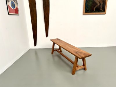 Petit banc en noyer, années 70