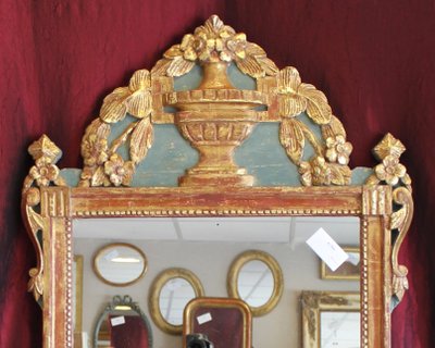 69 x 123 cm Louis XVI mirror, 18th century, carved and gilded wood