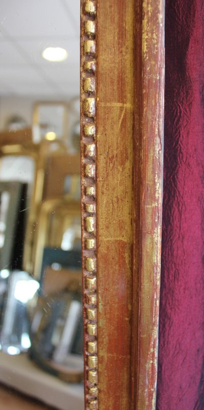 69 x 123 cm Louis XVI mirror, 18th century, carved and gilded wood