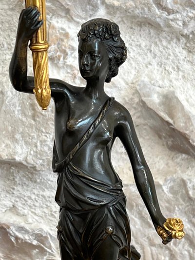 Paire de candélabres en bronze patiné et bronze doré, début du XIXème siècle.