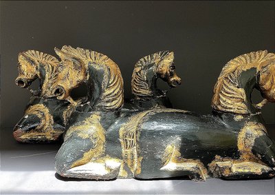 Italy, mid-20th century, pair of ornamental horses in black and gold lacquer.