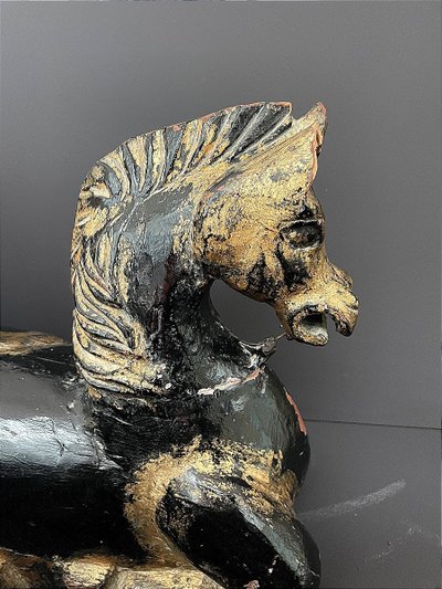 Italy, mid-20th century, pair of ornamental horses in black and gold lacquer.