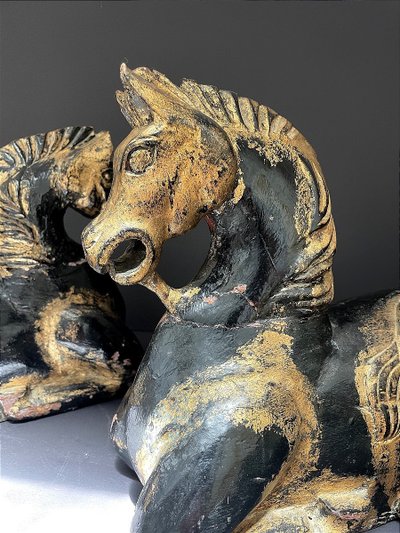Italy, mid-20th century, pair of ornamental horses in black and gold lacquer.