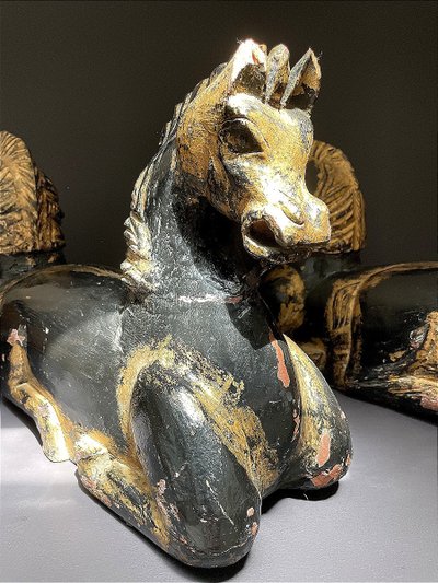 Italy, mid-20th century, pair of ornamental horses in black and gold lacquer.