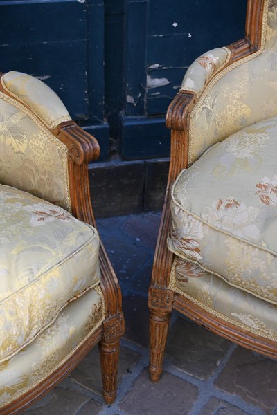 pair of Louis XVI bergere chairs stamped Delaporte XVIII