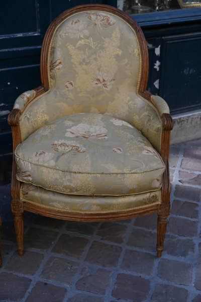 pair of Louis XVI bergere chairs stamped Delaporte XVIII