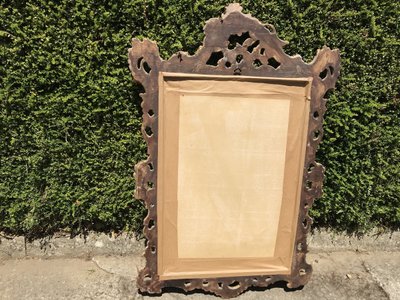 Antique Louis XV style gilded wood mirror from the 20th century