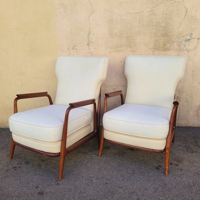 Pair of armchairs in the style of G Scapinelli, late 20th century