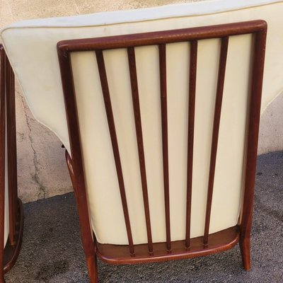Pair of armchairs in the style of G Scapinelli, late 20th century
