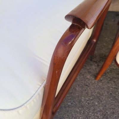 Pair of armchairs in the style of G Scapinelli, late 20th century