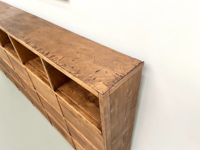Meuble de métier ancien à 24 casiers