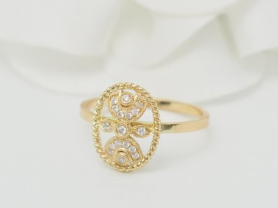 Bague ajourée en or jaune et diamants 