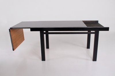 Table Brutaliste Noire à Allonge