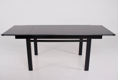Table Brutaliste Noire à Allonge