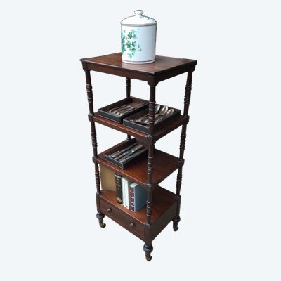 A shelf that can be used as a bookcase or a serving trolley