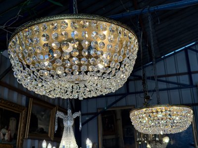 Pair of large Louis XVI style ceiling lights, crystal and brass pendants