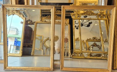 Paire de miroirs style Directoire dorés