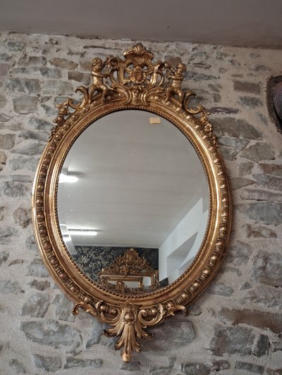 Specchiera ovale con putti XIX secolo 124 x 81