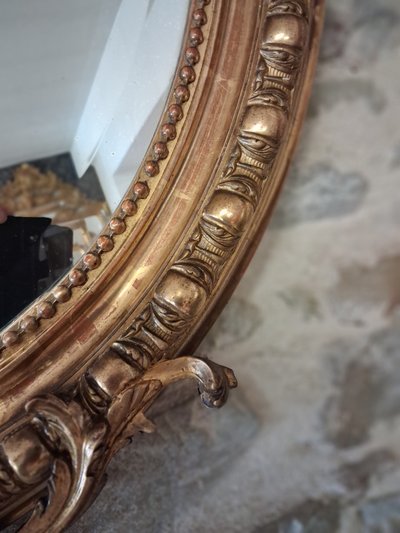 Specchiera ovale con putti XIX secolo 124 x 81