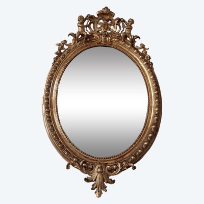 Specchiera ovale con putti XIX secolo 124 x 81