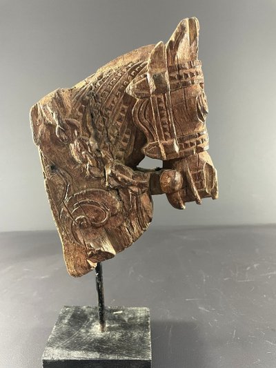 India, 19th century, Votive sculpture in the form of a harnessed horse's head.