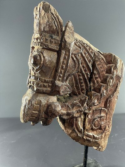 India, 19th century, Votive sculpture in the form of a harnessed horse's head.