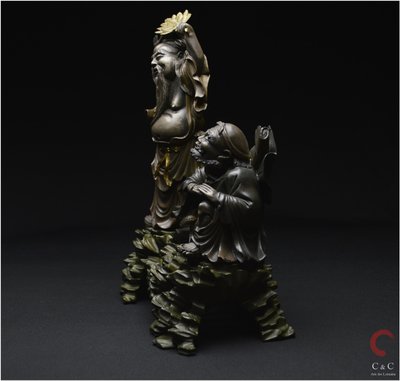 China, Qing Dynasty, 19th century, Polychrome lacquered wood group representing two Immortals