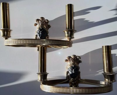 Maison BAGUES, Aux Indiens wall lights in gilded and patinated bronze