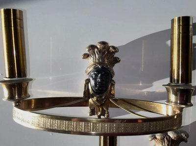 Maison BAGUES, Aux Indiens wall lights in gilded and patinated bronze